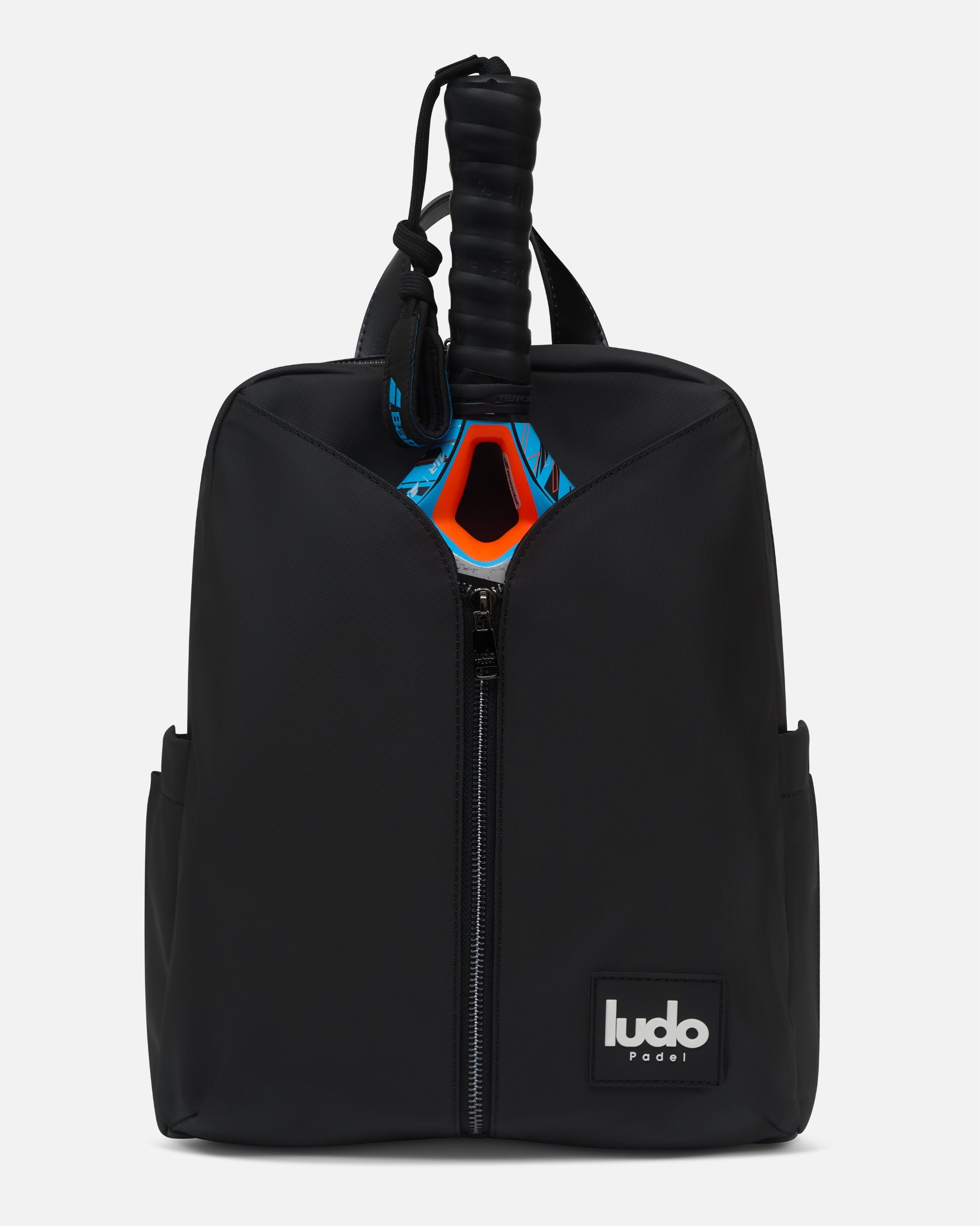 Ludo Padel everyday bag in gunmetal black, front view, with padel racket stored in front pocket against white background
